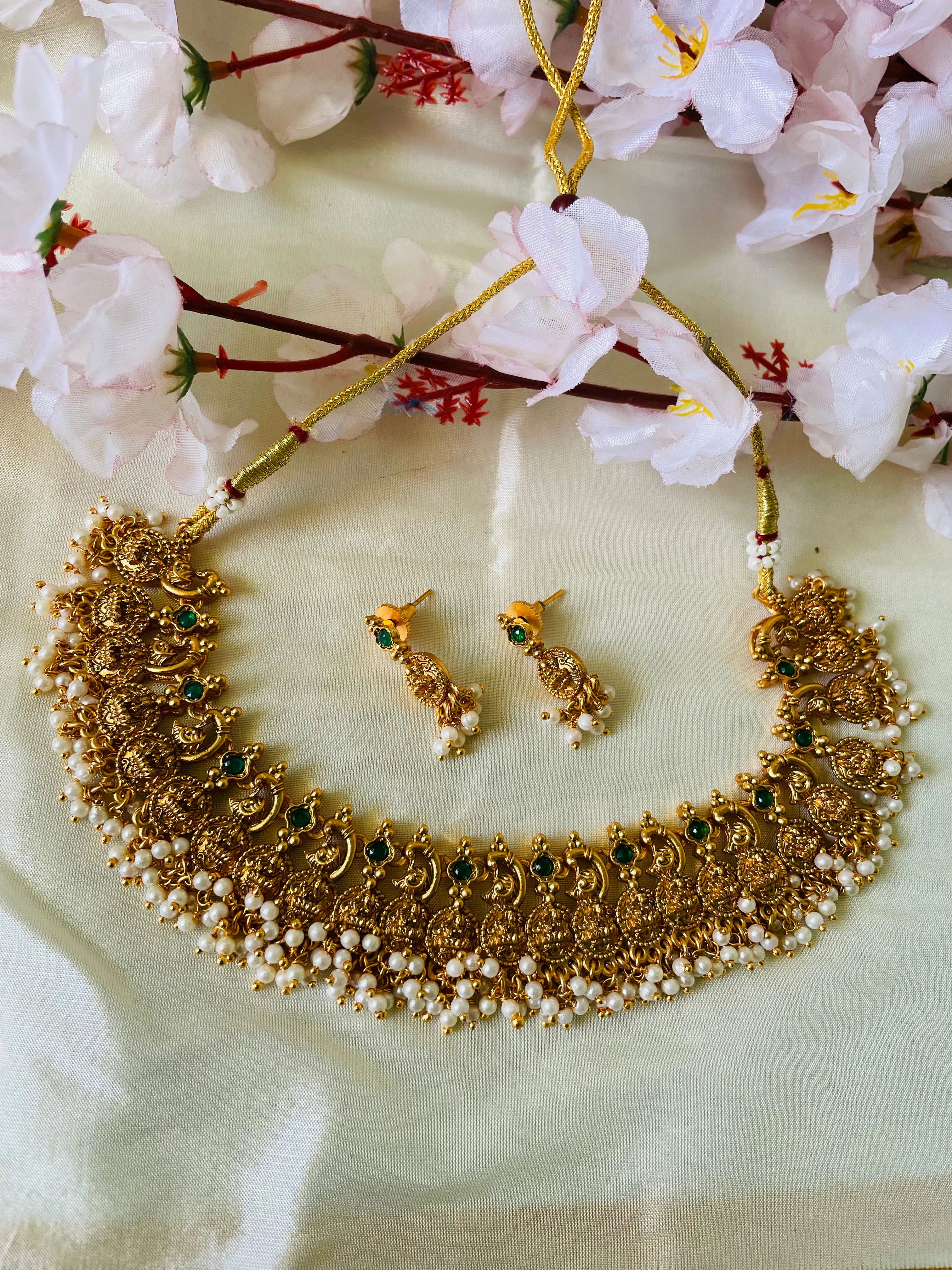 Lakshmi white golden beads